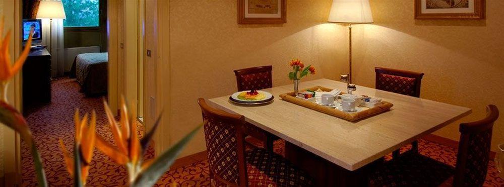 Atahotel Quark Мілан Номер фото