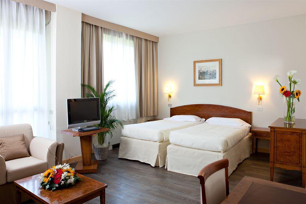 Atahotel Quark Мілан Номер фото